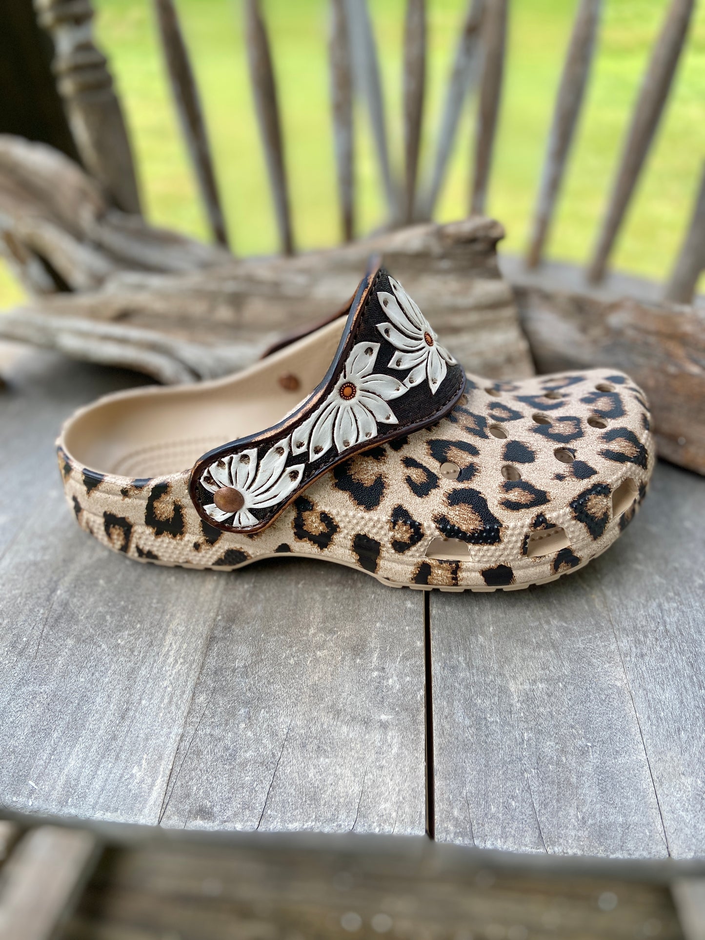 Animal print crocs with vintage looking daisy leather straps