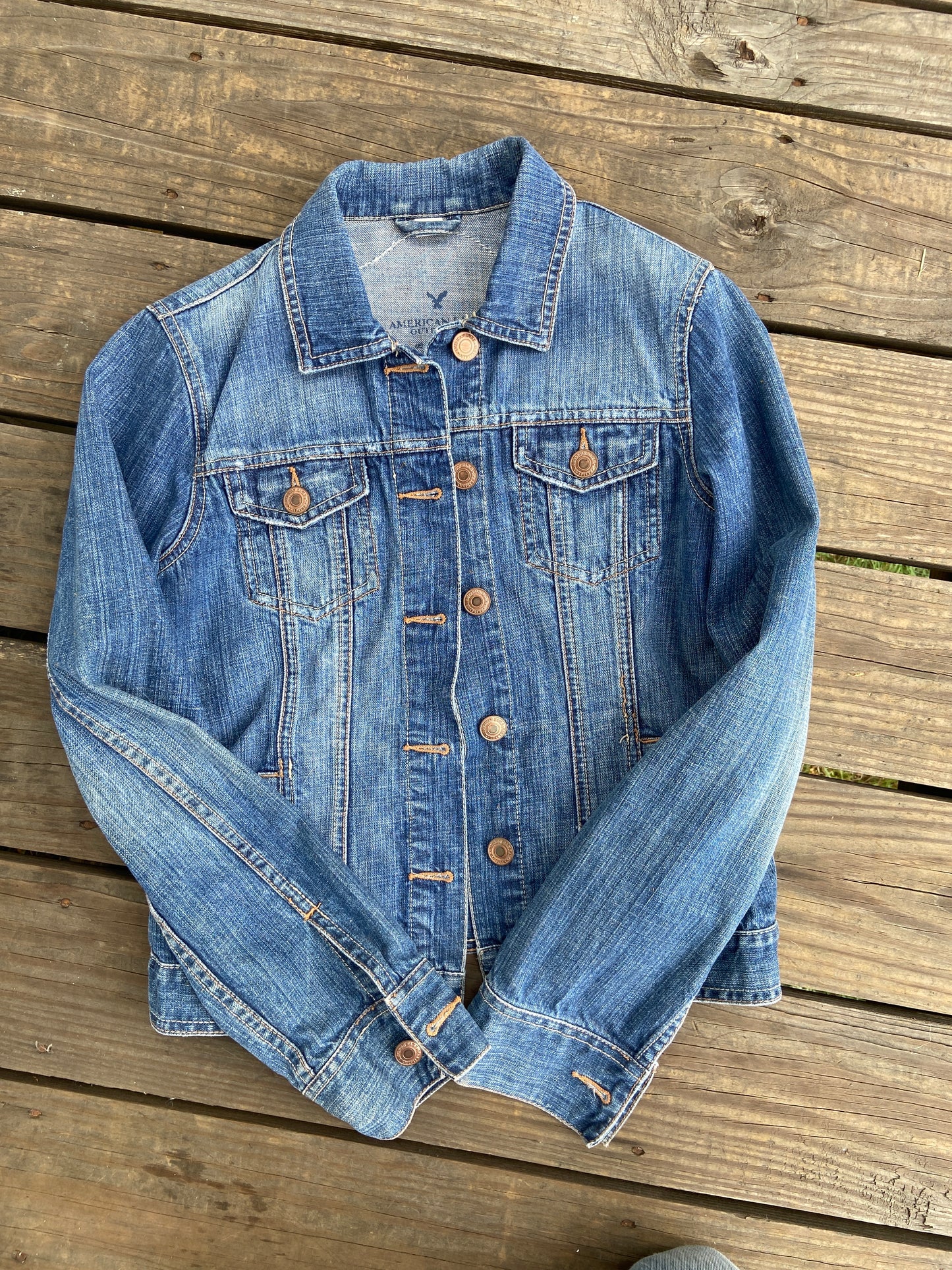 Vintage American Eagle jean jacket with leather patch and fringe