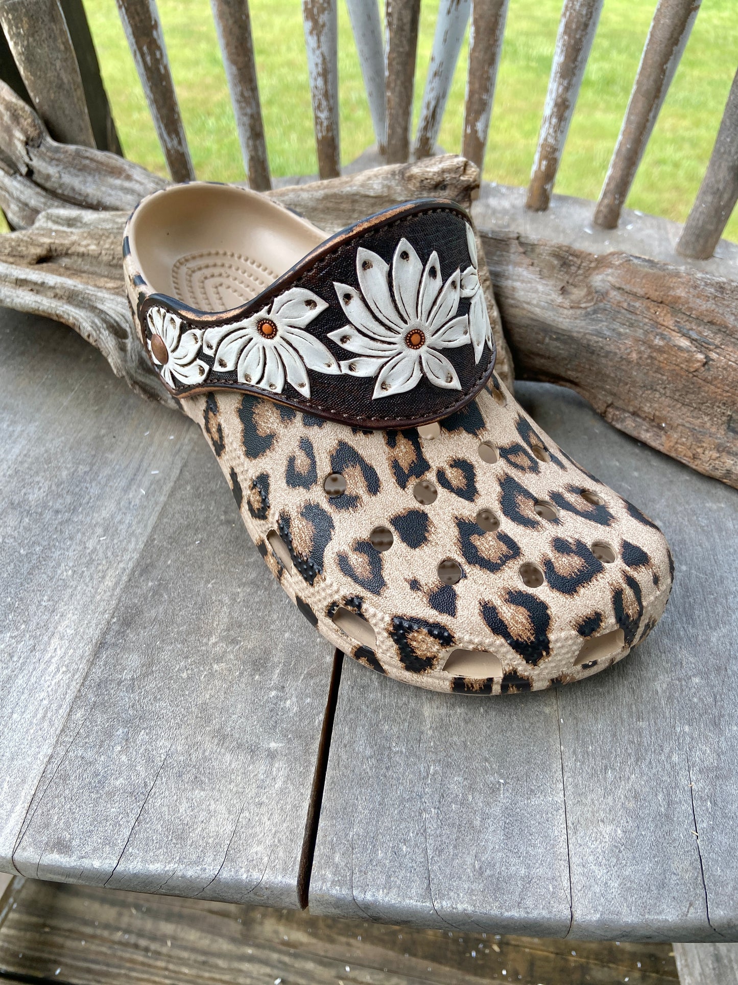 Animal print crocs with vintage looking daisy leather straps
