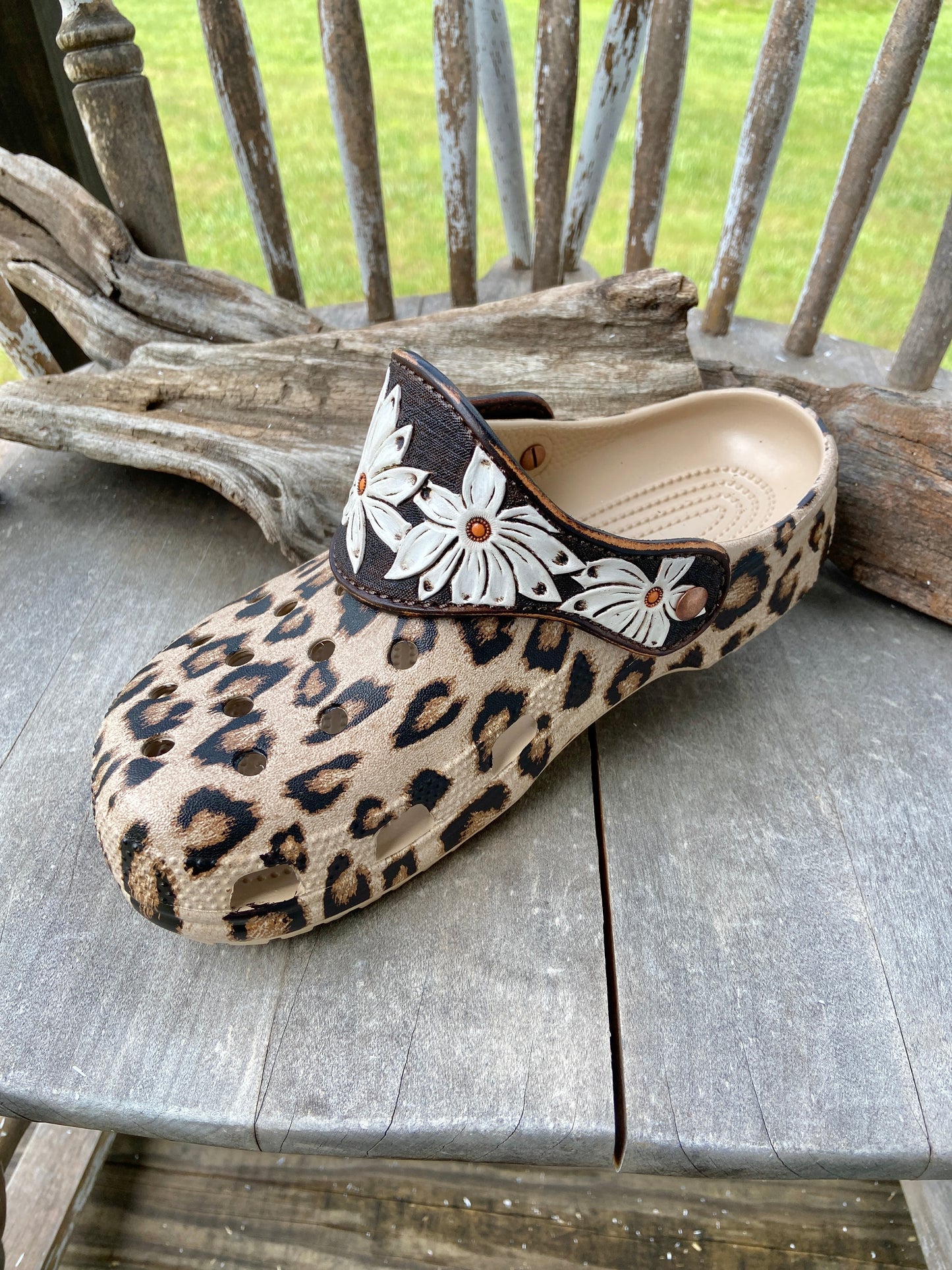 Animal print crocs with vintage looking daisy leather straps