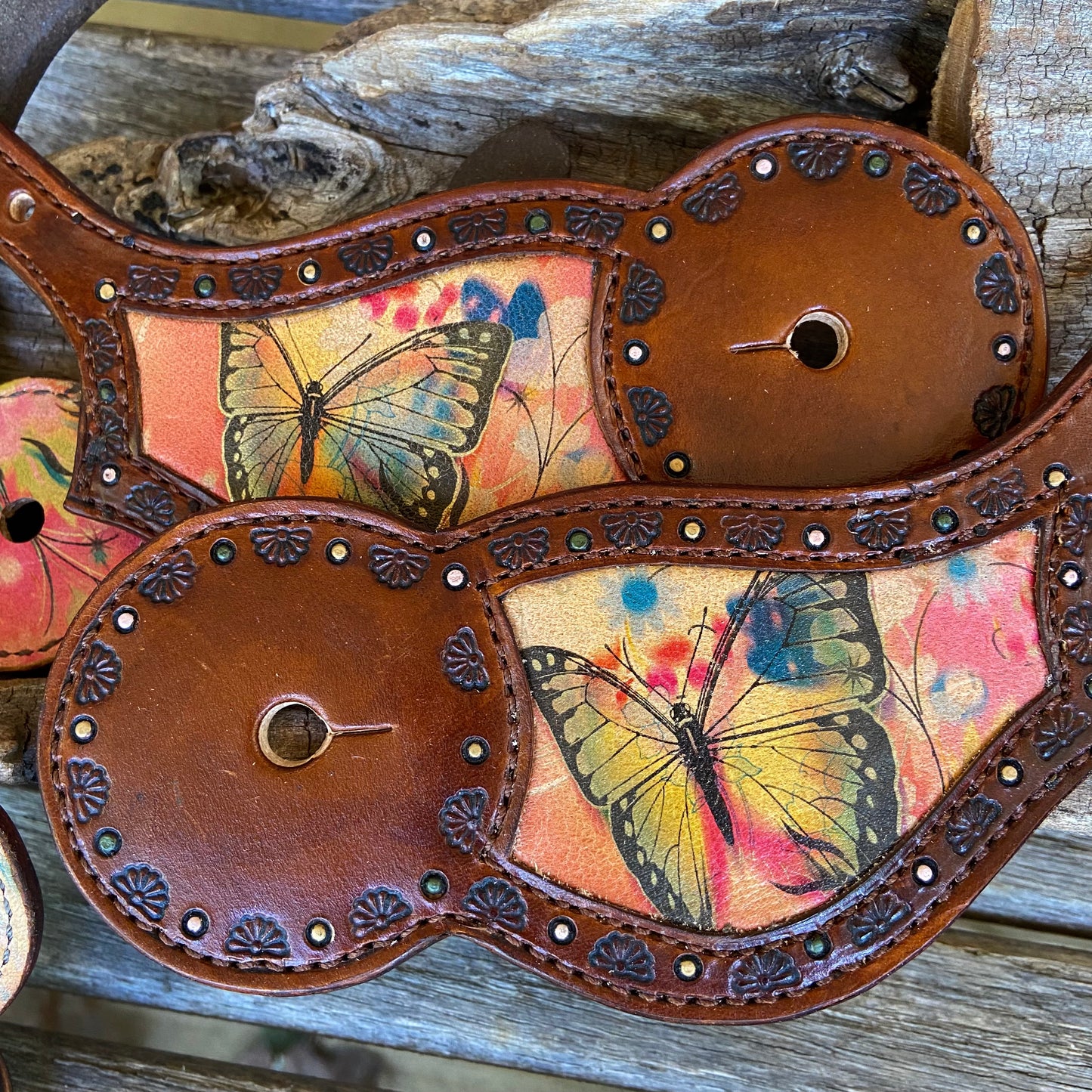 Western spur straps with butterfly inlay
