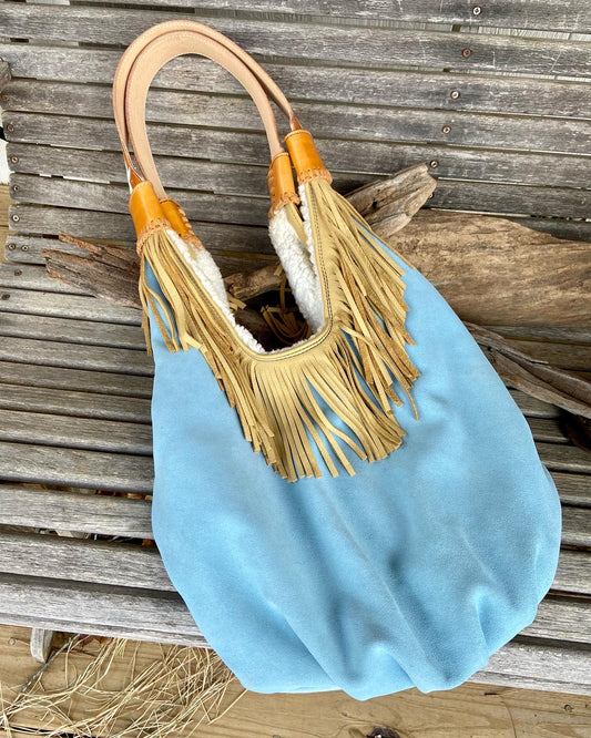 Ice blue suede fringe bag